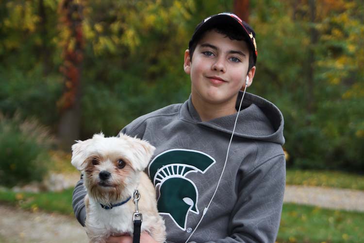 Damian Diamante started a dog walking service after taking a Generation E course. Photo by Susan Andress