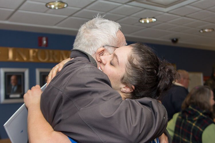There were lots of human hugs and doggy kisses when volunteers in the Hug Ambassadors program recently offered hugs to veterans at the VA in Battle Creek.