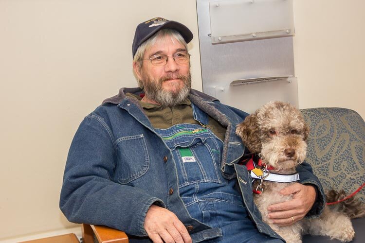 There were lots of human hugs and doggy kisses when volunteers in the Hug Ambassadors program recently offered hugs to veterans at the VA in Battle Creek.