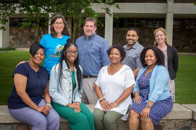 Front row, seated, from left, Ronicka Hamilton, director; Antwinae McNeil, Seita Scholar; Lakeyla Whitaker, campus coach; Nicollette Alston, administrative assistant. Back row, standing, from left, Yvonne Unrau, director - Center for Fostering Succes