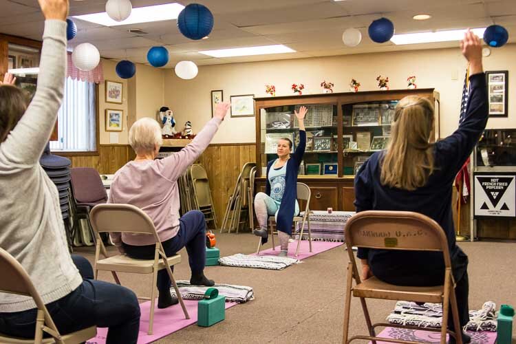 Leslie Neuman leads yoga classes at the Oakwood Community Center.