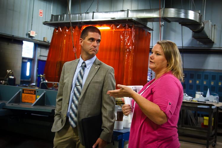 Eric Greene and Casey Fairly discuss the training opportunities for those who attend Kellogg Community College's Regional Manufacturing Technology Center.