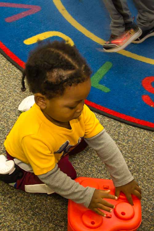 Playing to learn at Take-A-Break Childcare.