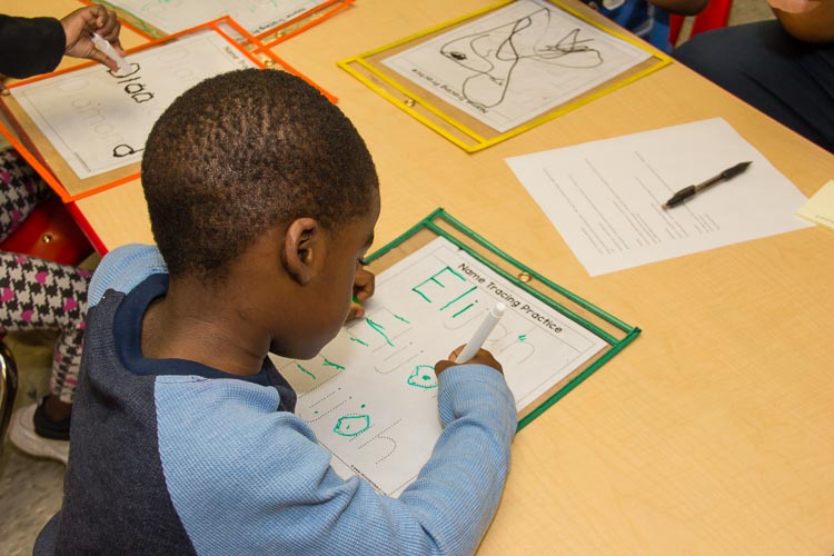 Preschoolers at New Genesis enjoy learning and playing.