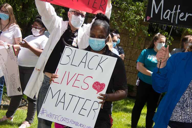 More than 100 staff at Family Health Center gathered to take a knee for 8 minutes and 46 second in honor of George Floyd and to promote racial justice and equity. 