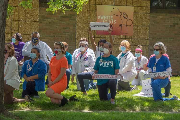 More than 100 staff at Family Health Center gathered to take a knee for 8 minutes and 46 second in honor of George Floyd and to promote racial justice and equity. 