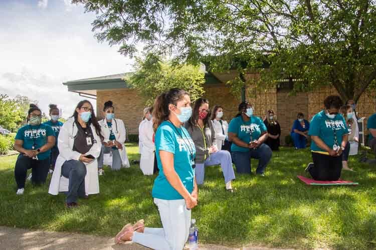 More than 100 staff at Family Health Center gathered to take a knee for 8 minutes and 46 second in honor of George Floyd and to promote racial justice and equity. 