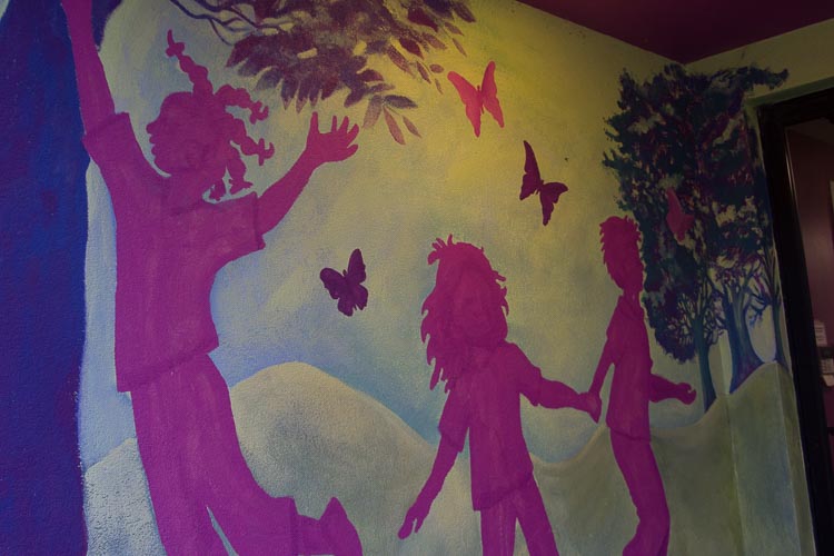 A mural welcomes students to the New Genesis after-school program.