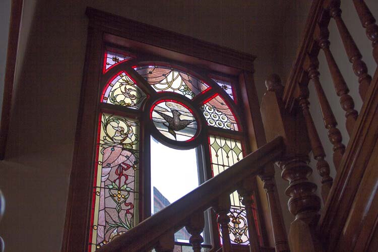 Stained glass windows are found in many places in the home.