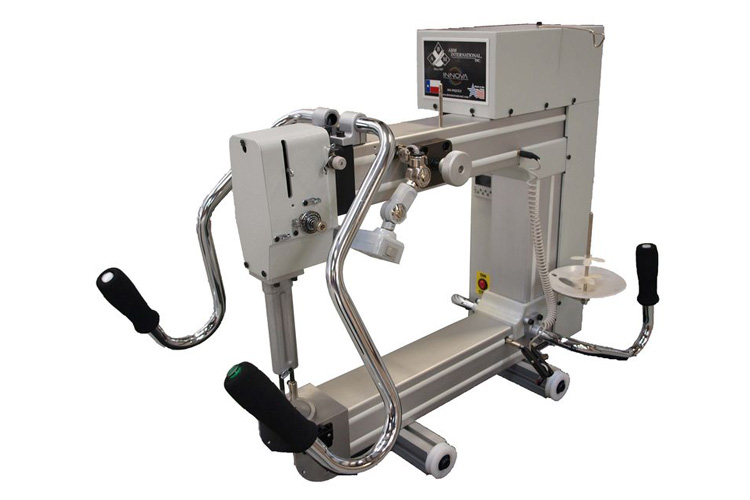 A longarm quilting machine sold by Accomplish Quilting