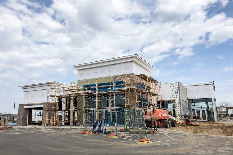 Construction underway at the Corner @ Drake retail center being developed by AVB.