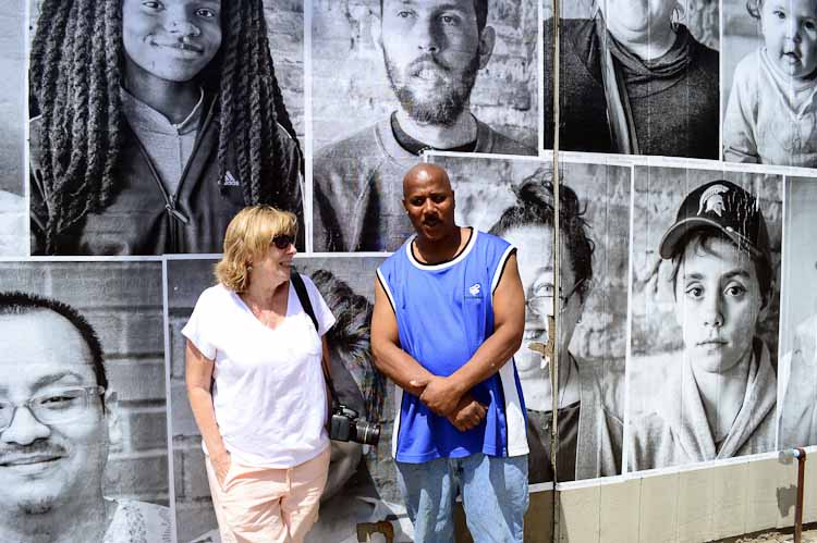 Fran Dwight with Edison resident Travis Thomas. Photo by Mark Wedel