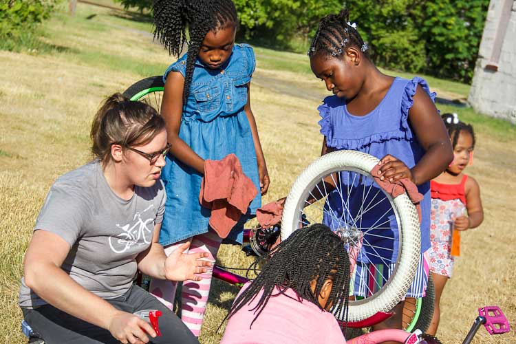 Erin Denay, left, with the young people of Open Roads