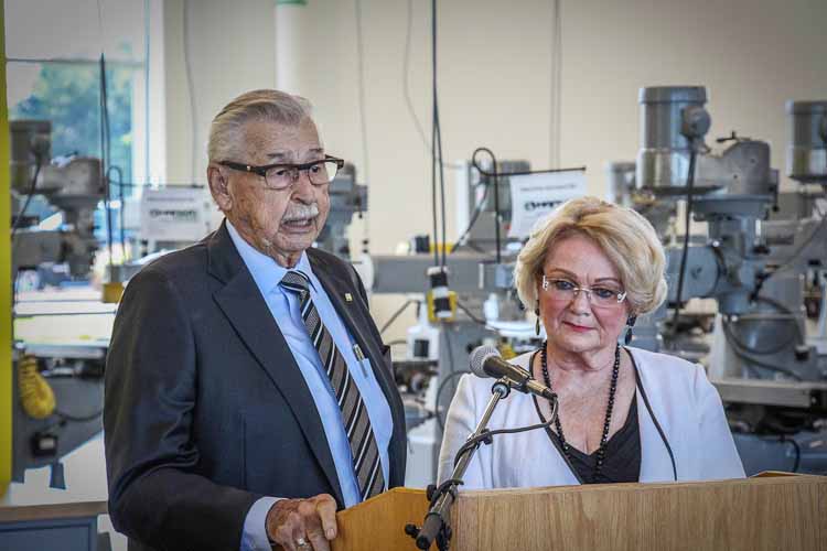 Merlin and Carolyn Hanson speak at a luncheon before the grand opening of Hanson Technology Center