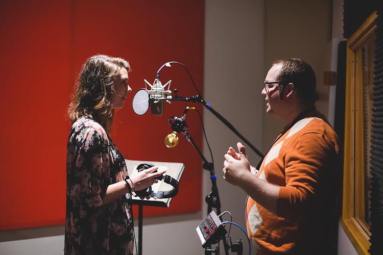 Gordon works with an artist during Songs against Slavery Session