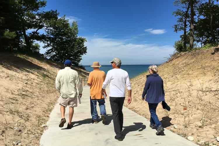 Patrons take the barrier free walkway to the beach