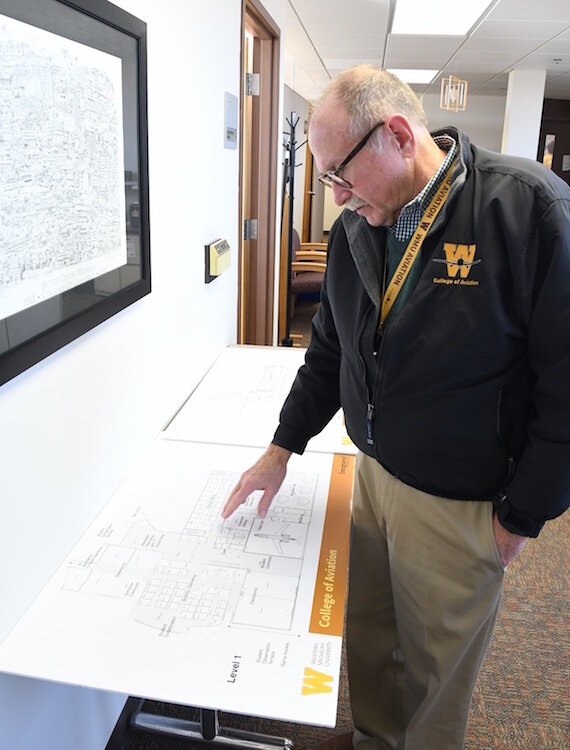 Dave Powell, dean of WMU’s College of Aviation, looks over expansion plans.