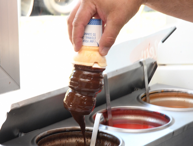 A chocolate dipped cone.