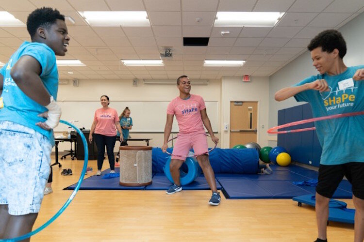 Learning and having fun at the sHaPe (Summer Health Activities and Professions Exploration) Camp.(Photo taken prior to social distancing orders)