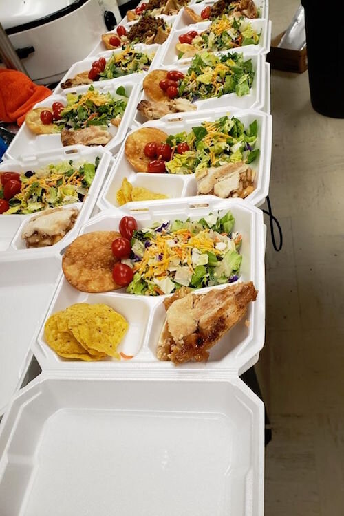 The SHARE Center at 120 Grove Street makes up meals to go for those who normally eat at the center.