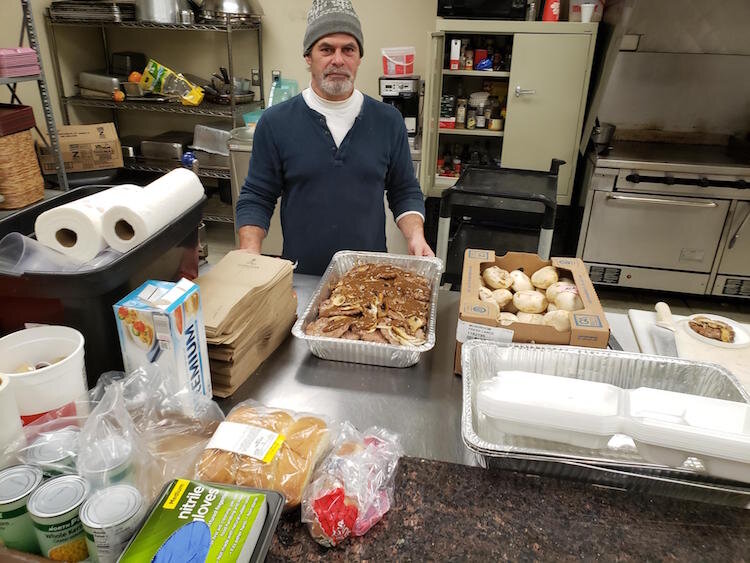 SHARE Center kitchen manager Brett Chew is making Salisbury steak for  dinner on April 1. He has been doing what SHARE Executive Director Robert Elchert describes as an awesome job as have his other staff members.