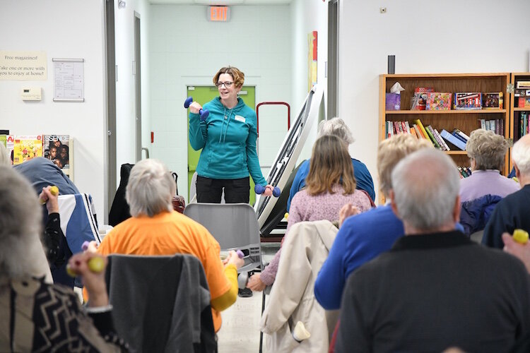 Julie Kaminski leads a Senior Health Partners exercise class at the Trinity Neighborhood Center.