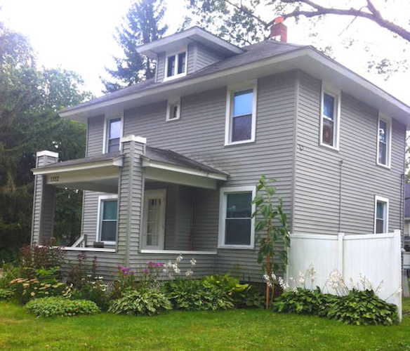 This home has square pillars out front.