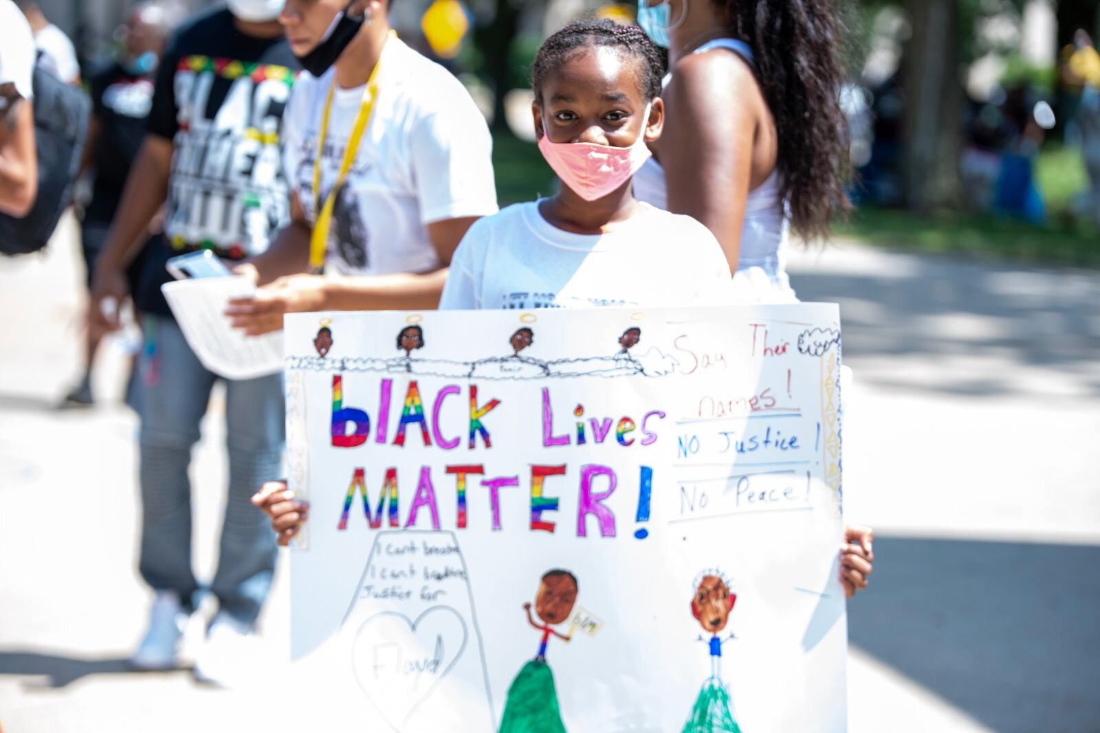 A few hundred people gathered Saturday afternoon in Bronson Park in downtown Kalamazoo for the “Let Your Voice Be Heard” rally and march.