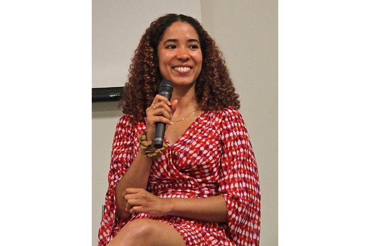 Franchesca Peña answers questions during a public meeting at the downtown Kalamazoo library.