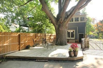 Staci and Justin Gibson looked at only two houses in the Stuart Neighborhood before they decided to buy their home there eight years ago. "I was sold when I saw the tree," Staci says of the huge oak in the backyard.