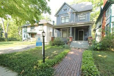 "I think we always wanted to live in an older house," Staci Gibson says of the four-bedroom house she and her husband have called home over the last eight years. Built in 1903, it is shown when it was on sale.