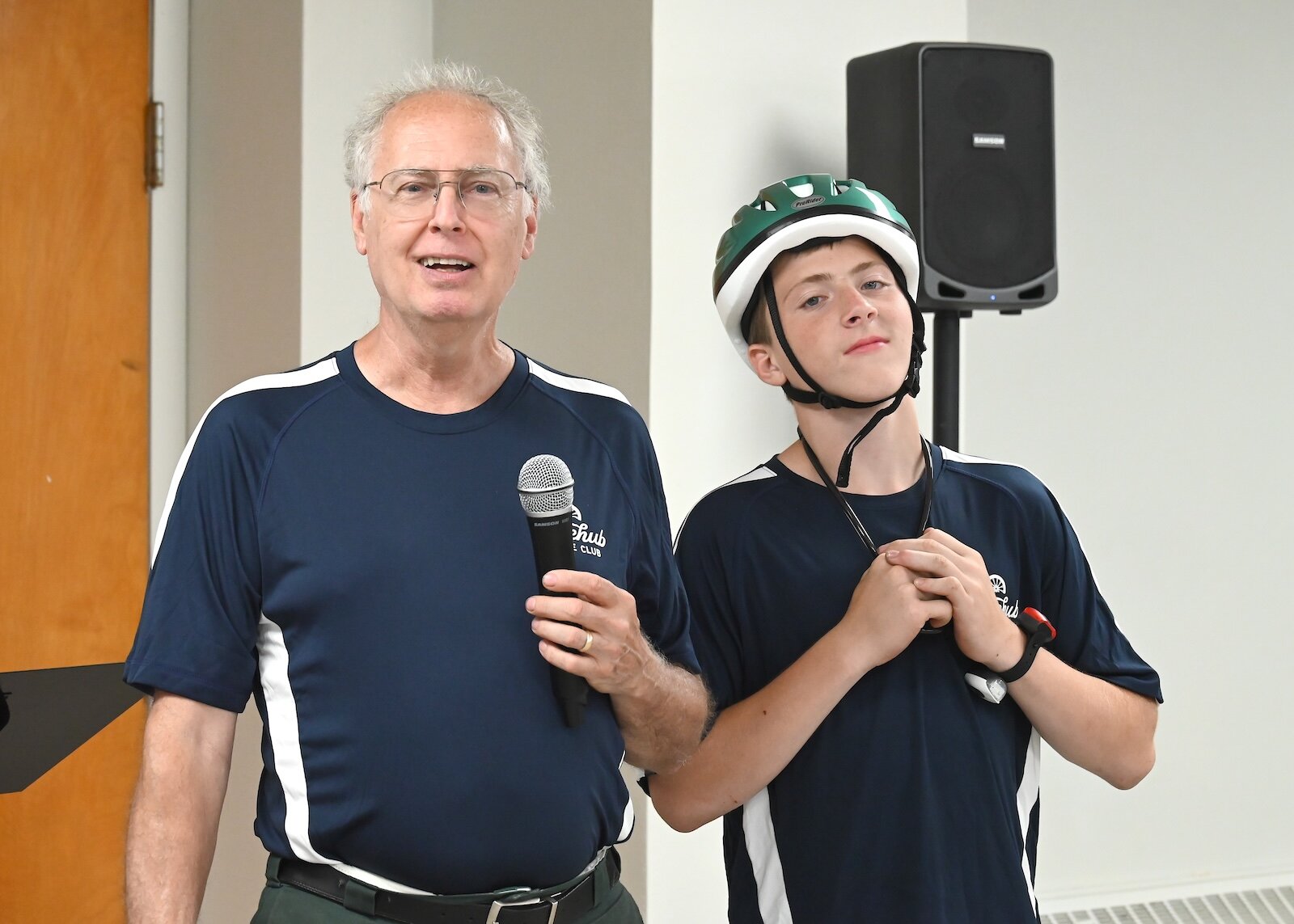 Mentor Gary Held and Brandon Wadley pose for a graduation photo.