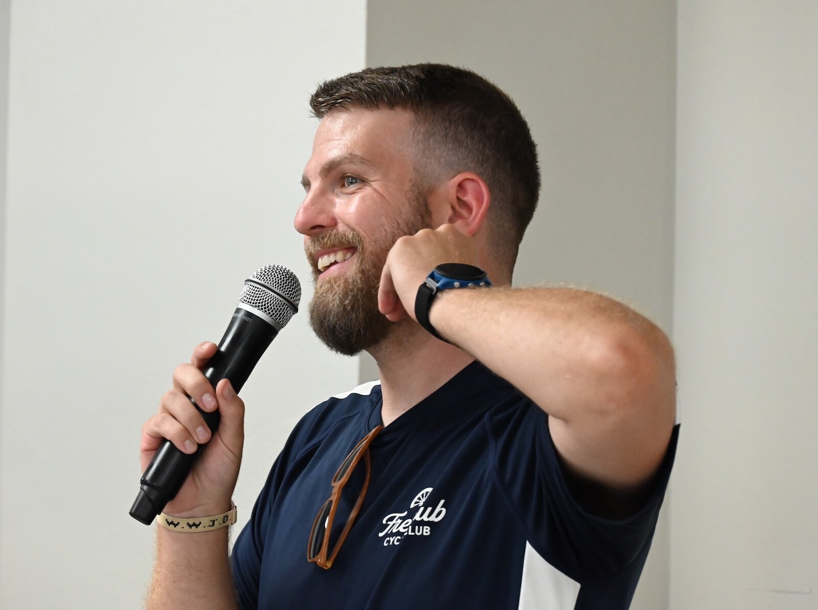 Colin Sherfield, Youth and Outreach Pastor at the Battle Creek Community Church, talks to members of the Freehub Cycle Club.