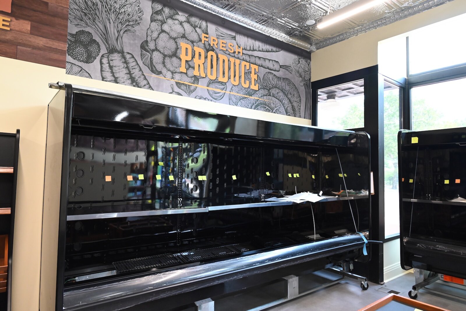 Empty shelves and spaces in the Uproot Market will soon be filled with foodstuﬀs.