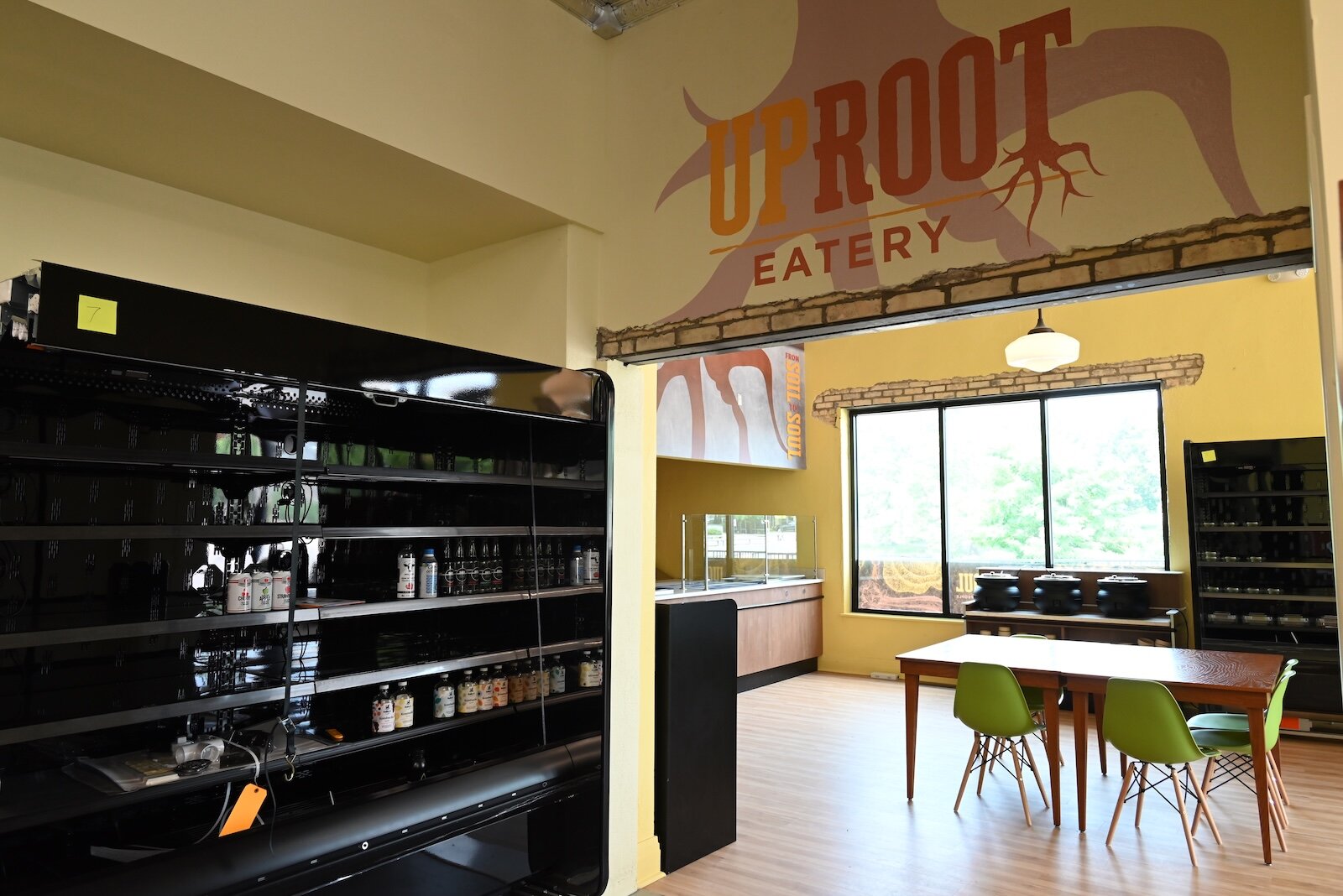 Empty shelves and spaces in the Uproot Market will soon be filled with foodstuﬀs.