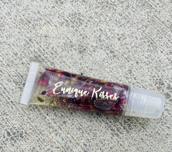 This tube contains rose petals infused with hemp. Richardson fills the tubes containing her proprietary formulas and her parents help her with the labeling and packaging.