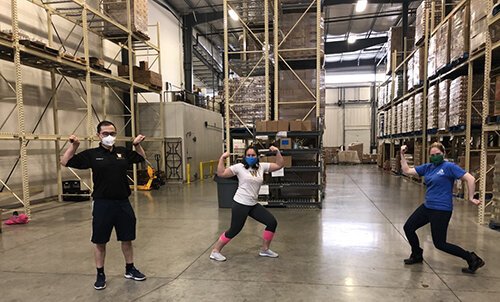 Third-year students Terrence Li, Marine Bolliet, and Kelsey Miller volunteered at Kalamazoo Loaves and Fishes.