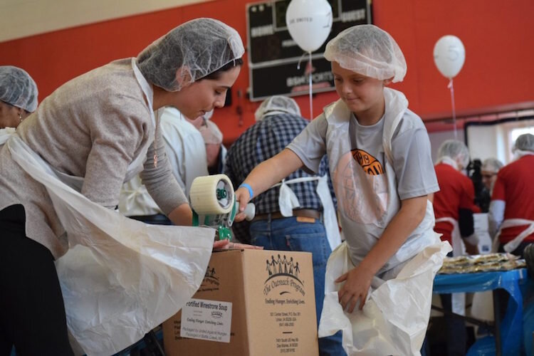 Volunteers help in a local food pantry.