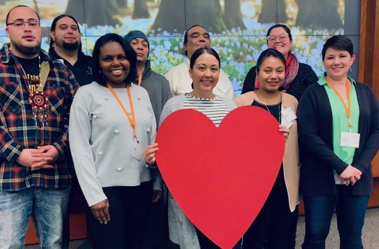 Elizabeth Garcia (center with heart), the new Battle Creek Coalition for Truth, Racial Healing Program Director,