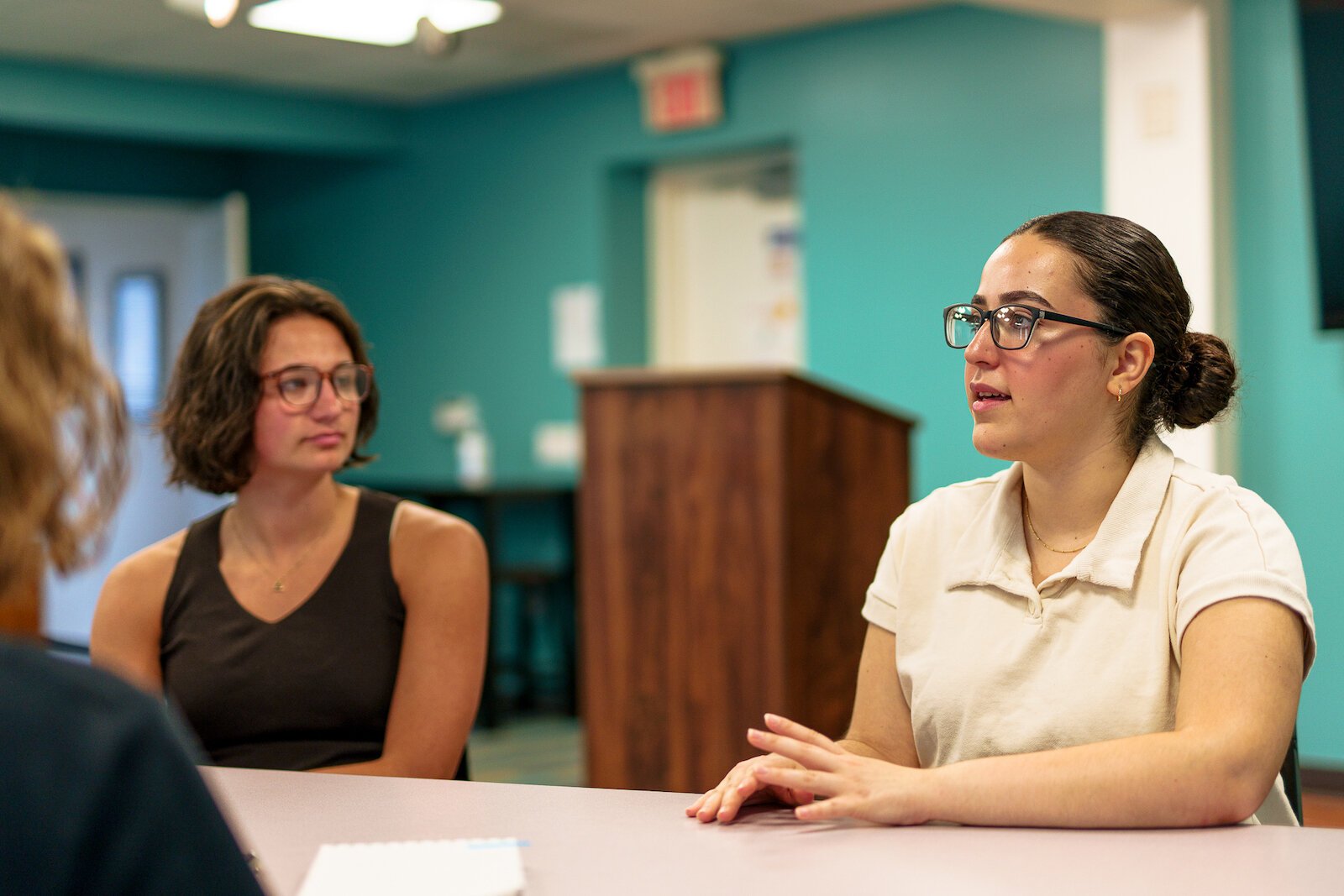 Haila Jiddou (right), Danielle DeVine (left) say the internship is teaching them new skills.