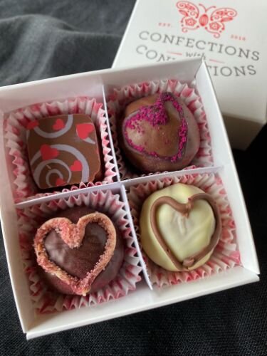 A Valentine’s Day assortment at Confections with Convictions includes these truffles, which the Kalamazoo shop has dubbed “Love Potions.”