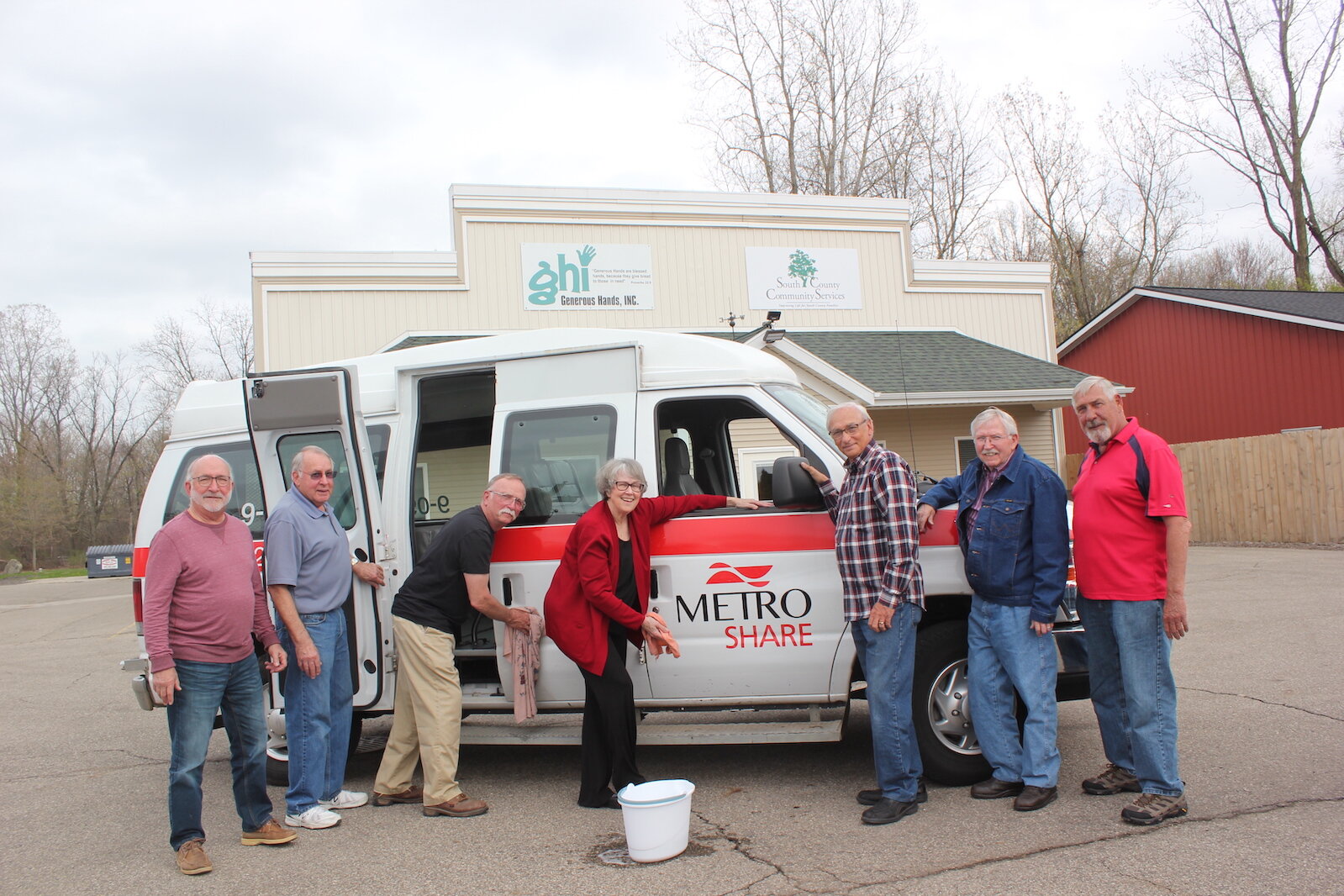 Metro Connect vans serve rural areas among other destinations. The team loves a clean van.  They are Dave Carvell, Bill Hunt, Larry Forsyth, Danna Downing, Wes Bittenbender, Dale Holder, and Doug Vliek.