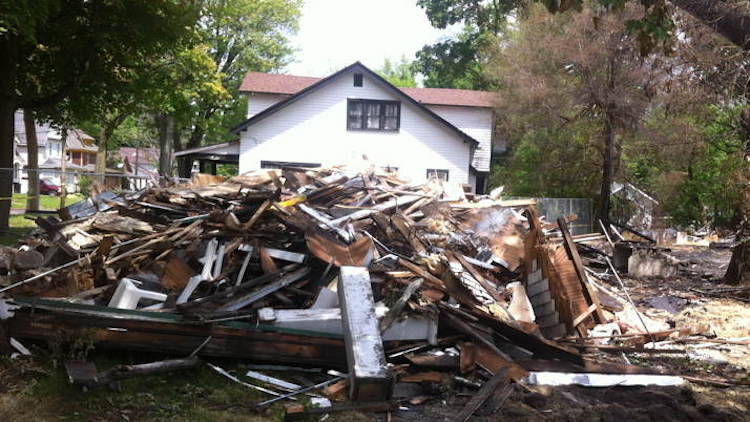 Nancy Harwood escaped from this house with nothing but the pajamas she was wearing. The burned remains of the houses were quickly demolished.