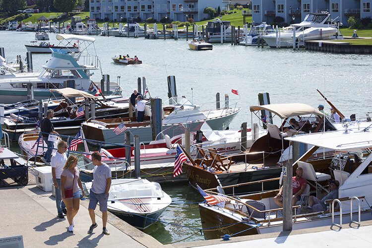 “We have a great community that rallies around an event like this and we just have a lot to offer in downtown Port Huron,” says Audrey Torello, Exec. Director of Michigan Mutual Mortgage which sponsored the Boat the Blue Antique & Classic Boat Show.