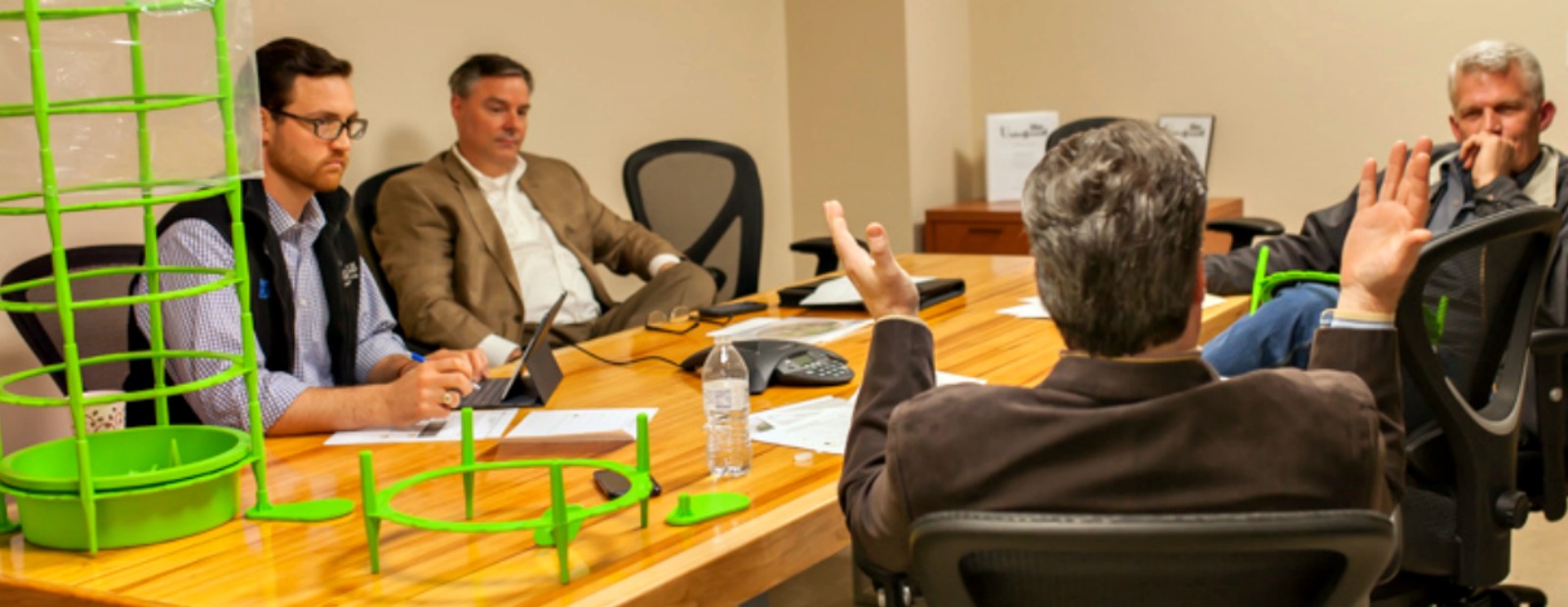 Quentin Bishop and Dan Casey of the EDA, discuss ideas with fellow businessmen at The Underground.