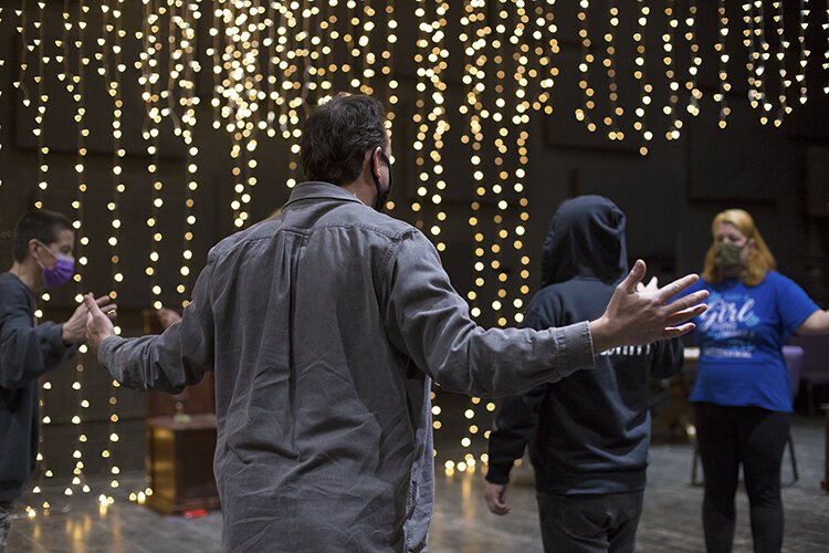 A group participates in a mirror theater exercise as part of an Improv Lab with Enter Stage Right at The Citadel Stage. The exercise helps cast members bond while also honing their observation and concentration skills.