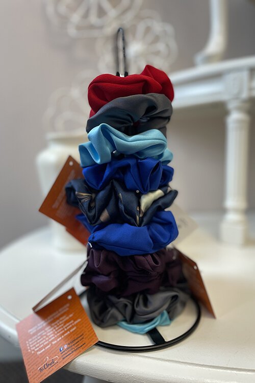 Handmade hair scrunchies repurposed from dresses.