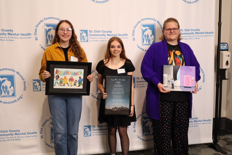 (from left to right): Ella Vokes (Memphis High School), Kaelin Morris (Yale High School), and Alan Daugherty (Yale Jr. High School), received awards for winning the artwork and creative writing portions of the Creative Arts Contest.