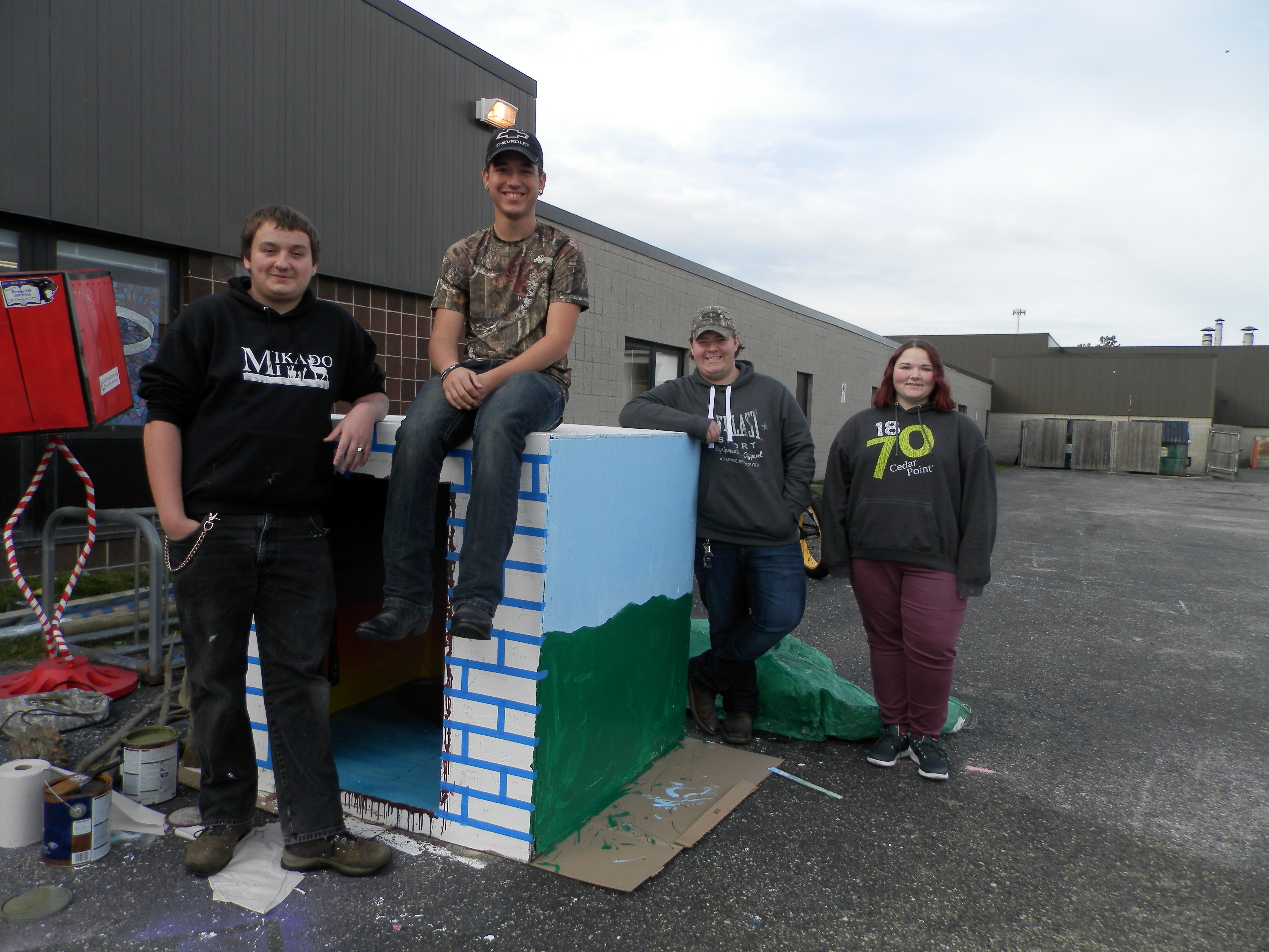 Dalton Formaz, Darrin Richards, Taylor Finley,and Alissa Warrack have one side of the box to express themselves.They have chosen the theme of Alice and Wonderland. 