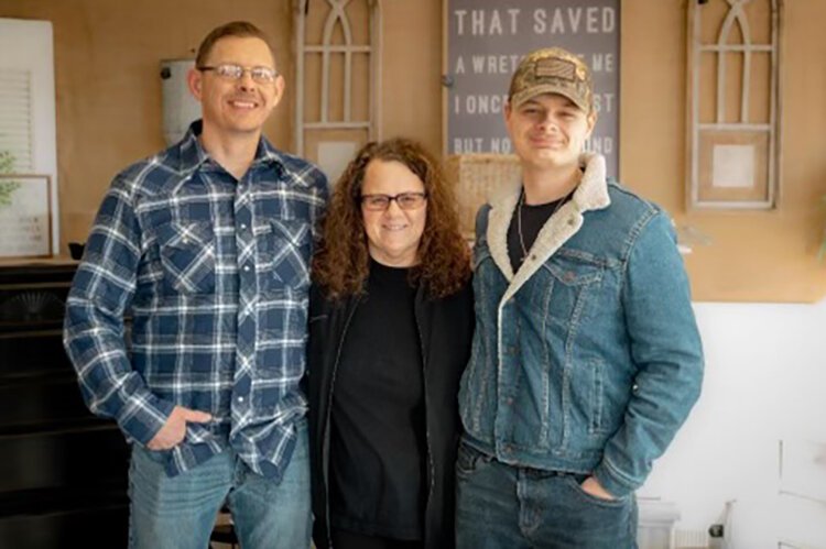 The Horn family (from left) Bob, Aime, and Toby.